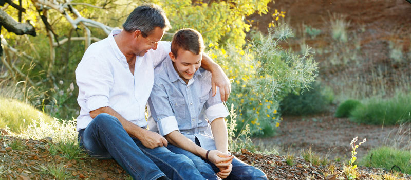 Dad in the bush with his son
