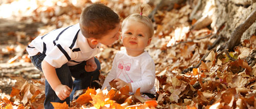Kids in Leaves